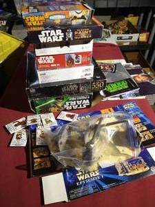 lot 312 image: Star Wars Lot - Puzzles, Posters, Pins, and Hanger Bay