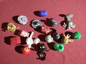 lot 322 image: Lot of Bakugan Spinmaster Toys