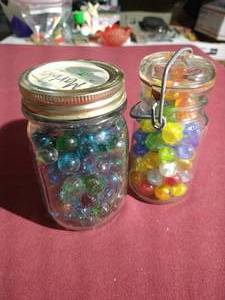 lot 345 image: (2) Jars of Marbles