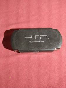 lot 368 image: Sony PSP Case - Movies & Games