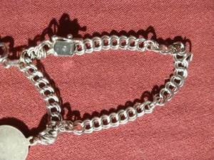 lot 438 image: Sterling Charm Bracelet With Sterling Charm