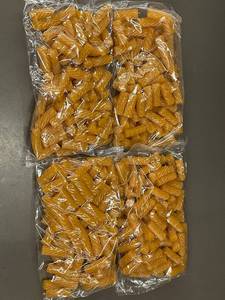 lot 31 image: Natural Mango Licorice 875g (Best Before 11 Sep 2025) - 4 bags 875 grams each