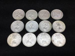 lot 190 image: (12) Canadian Silver Quarters 1956-1967