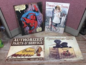 lot 262 image: 4 Vintage-Look Tin Signs - Remington - Indian - Spiderman - Sewing