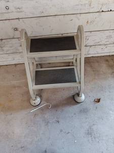 lot 8 image: Two-Step Rolling Metal Utility Ladder with Casters