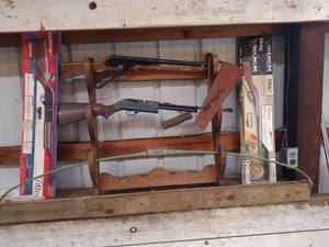 lot 23 image: Lot of Daisy BB Guns with Boxes and Wooden Gun Rack