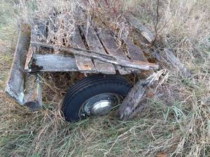 lot 28 image: Lot of Scrap Wood and Steel from Old Trailer Frames