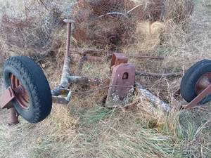 lot 29 image: Farm Trailer Axle Frame with Wheels and Scrap Metal Parts