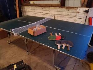 lot 42 image: Table Tennis Table with Net, 5 Paddles, and Ping Pong Balls