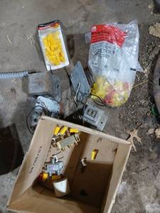 lot 60 image: Assorted Electrical Hardware with Wire Connectors, Cable Staples, and Metal Boxes