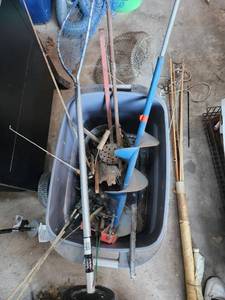 lot 116 image: Fishing Gear Collection with Nets, Rods, and Ice Augers