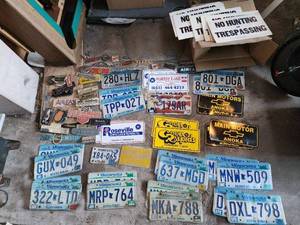 lot 117 image: Vintage License Plates, Dealer Tags, Signs, Decals and Motorcycle Windshield Lot