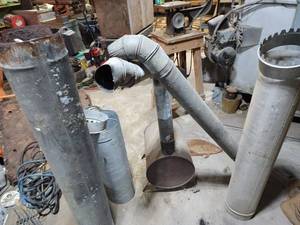 lot 133 image: Lot of Vintage Electric Auger, Live Animal Traps, and Assorted Metal Stove Pipe