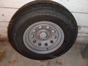 lot 66 image: ST22575R15 Trailer Tire with Steel Wheel