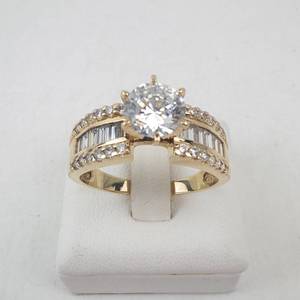 lot 1 image: Ladys 14K Yellow Gold Cubic Zirconia Ring with Baguette & Round Accents. Ring Size 10.