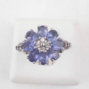 lot 26 image: Sterling Silver Tanzanite & Diamond Flower Ring