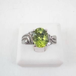 lot 42 image: Peridot & Diamond Ring - Sterling Silver - Size 6.5 - Oval Center Stone