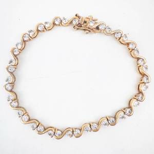lot 208 image: Gold-Tone Wave-Link Bracelet with Round-Cut Stones - 8-Inch Length