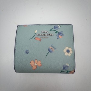 lot 4A image: New Coach Floral Print Zip-Around Wallet Light Blue Leather