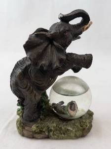 Elephant Figurine with Crystal Ball on Textured Base