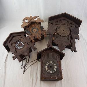 Set of 4 Vintage Carved Cuckoo Clocks with Birds & Maple Leaf Motifs. (PartsNeed Repairs)