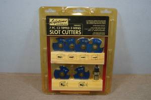 lot 92 image: 7-Piece C3 Tipped 3-Wing Slot Cutters