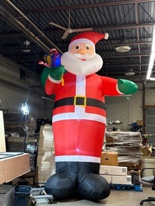 lot 11 image: 13 Outdoor LED Inflatable Santa Claus