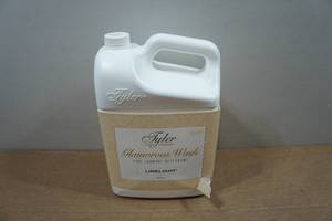 lot 141 image: 1 Gallon Tyler Candle Co Fine Laundry Detergent - Limelight