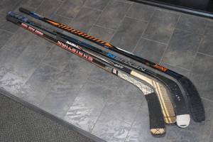 lot 307 image: 4 Hockey Sticks