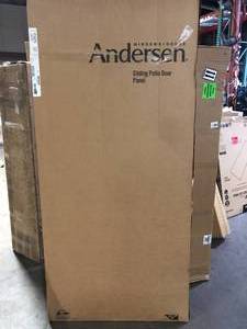 lot 40 image: Andersen 70-12 in. x 79-12 in. 200 Series Black Left-Hand Perma-Shield Sliding Patio Door with Black Interior, Moving Panel  Customer Returns See Pictures