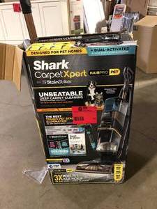 lot 54 image: Shark Carpetxpert Hairpro Pet with StainStriker, Corded Deep Rug and Upholstery Upright Carpet Cleaner in Metallics Customer Returns See Pictures