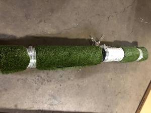 lot 55 image: TrafficMaster Landscape Turf 7.5 ft. x 10 ft. Green Artificial Grass Rug  Customer Returns See Pictures