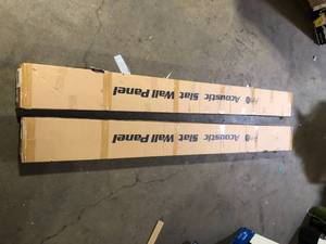 lot 57 image: Lot of Art3dwallpanels Walnut 0.83 in. x 0.65 ft. x 8 ft. Wood Slat Acoustic Panels, MDF Decorative Wall Paneling (4 Piece21 sq. ft.)  Customer Returns See Pictures