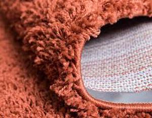 lot 50 image: Unique Loom Solid Shag Terracotta 9 ft. x 12 ft. Area Rug   Customer Returns See Pictures