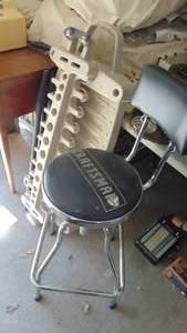 lot 157 image: Plastic Garage Lawn Tool Holder and Craftsman Stool