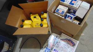 lot 191 image: Oil Filters, 7-New Bottles of Oil and Old Road Magazines