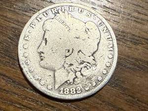 lot 5 image: 1882 O Morgan Dollar