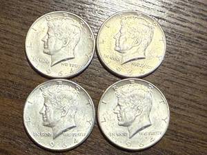 lot 15 image: 4 - 1964 Kennedy Half Dollars