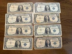 lot 27 image: 8 - One Dollar Silver Certificates