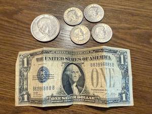 lot 51 image: 1928 A Silver Certificate, 1971 Ike Dollar & 4 Susan B Dollar Coins