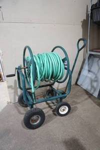 lot 11 image: Hose Caddy with hose