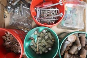 lot 94 image: coffee containers with bolts, water hose fittings