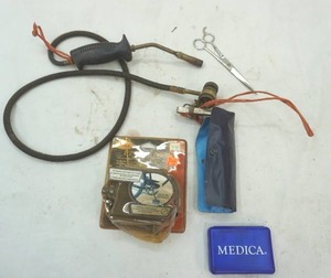 lot 147 image: Propane hose with torch end, bike pedal