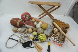 lot 255 image: Baseballs, Softballs, Wooden Clothespins, Footballs, Vintage Kids Ironing Board and More (5 gallon bucket included)