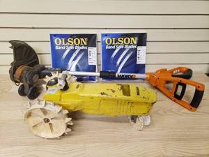 lot 11 image: Electric weed eater no battery or charger, sprinkler and 2 Olson band saw blades