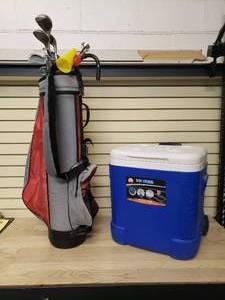 lot 12 image: Set of golf clubs with Irons and woods also funny cane with horn, Ice Cube 60 qrt cooler