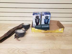 lot 36 image: Under ground sprinklers 2 off road lights 3 mower blades