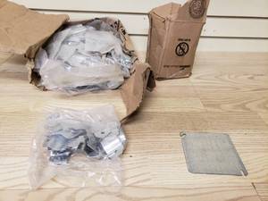 lot 56 image: Box of Electrical box cover and box of Clips