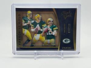 lot 203 image: 2016 Panini Franchise Gold Black and Gold Brett Favre, Aaron Rodgers, Don Majkowski Serial Numbered 7199
