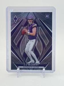 lot 345 image: 2024 Panini Phoenix - Rookies J.J. McCarthy #185 Rookie Card